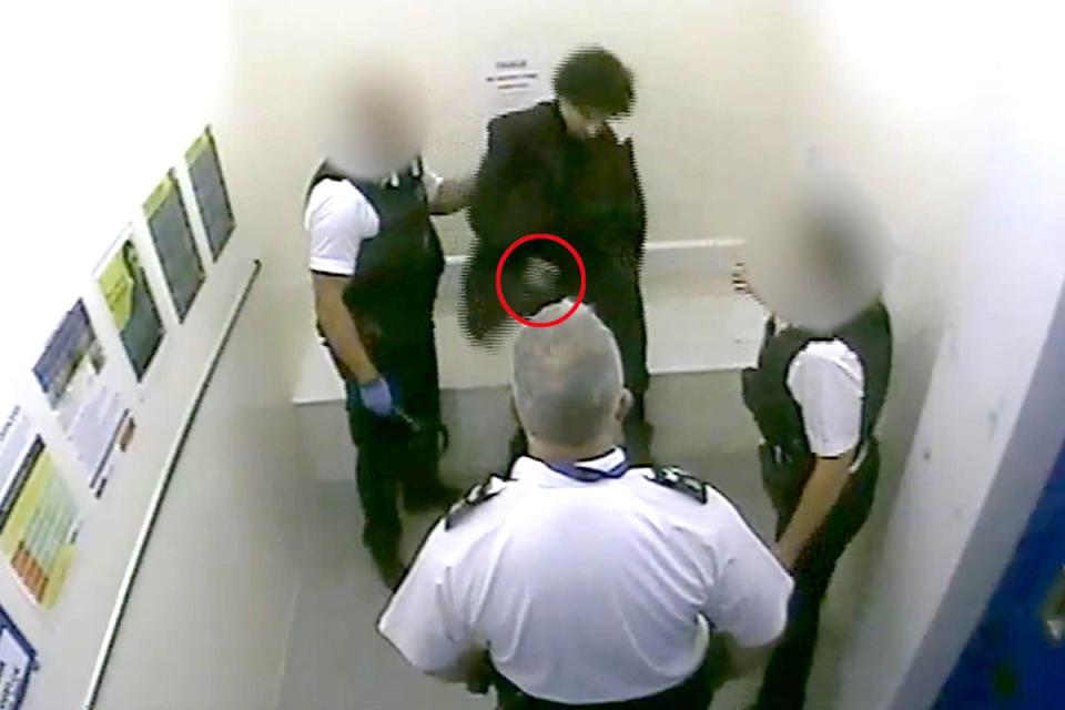 CCTV showing Louis De Zoysa (centre, top) holding an item (circled in red) in his hand, seconds before Sergeant Matt Ratana (centre) was fatally shot (Metropolitan Police/PA) (PA Wire)