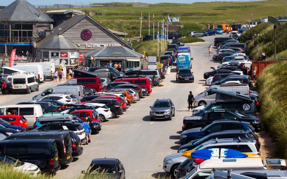 A full carpark at Fistral beach in Cornwall. -  South West News Service