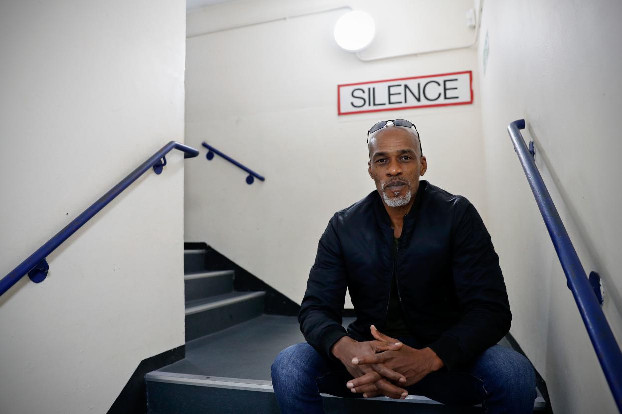 Former England cricketer Chris Lewis poses for a photograph at The Haymarket theatre in Basingstoke on April 10, 2019. - Chris Lewis's journey from opening the bowling for England in the 1992 World Cup final to contemplating suicide and being convicted of drugs smuggling has him feeling as ambitious as when he was a teenager he told AFP. The 51-year-old -- who represented England over 80 times in Tests and One Day Internationals -- said it was fear over being penniless that drove him to smuggle £140,000 ($183,000) of cocaine in cans of fruit into England from St Lucia in 2008 which would have earned him £50,000. The all-rounder -- who served six-and-a-half years of a 13 year prison term -- is presently touring with the play written by Dougie Blaxland (the pen name of former cricketer James Graham-Brown) about him called 'A Long Walk Back'. (Photo by Adrian DENNIS / AFP)        (Photo credit should read ADRIAN DENNIS/AFP via Getty Images)