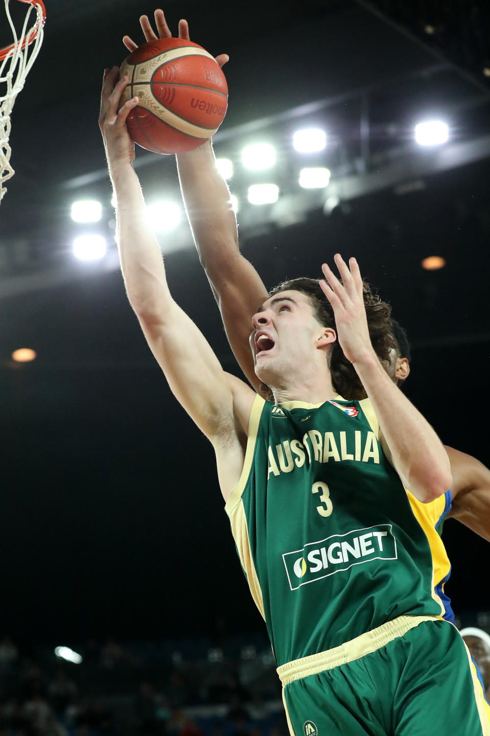 MELBOURNE, AUSTRALIA – AUGUST 16: Josh Giddey of Australia shoots during the match between the Australia Boomers and Brazil at Rod Laver Arena on August 16, 2023 in Melbourne, Australia. (Photo by Kelly Defina/Getty Images)