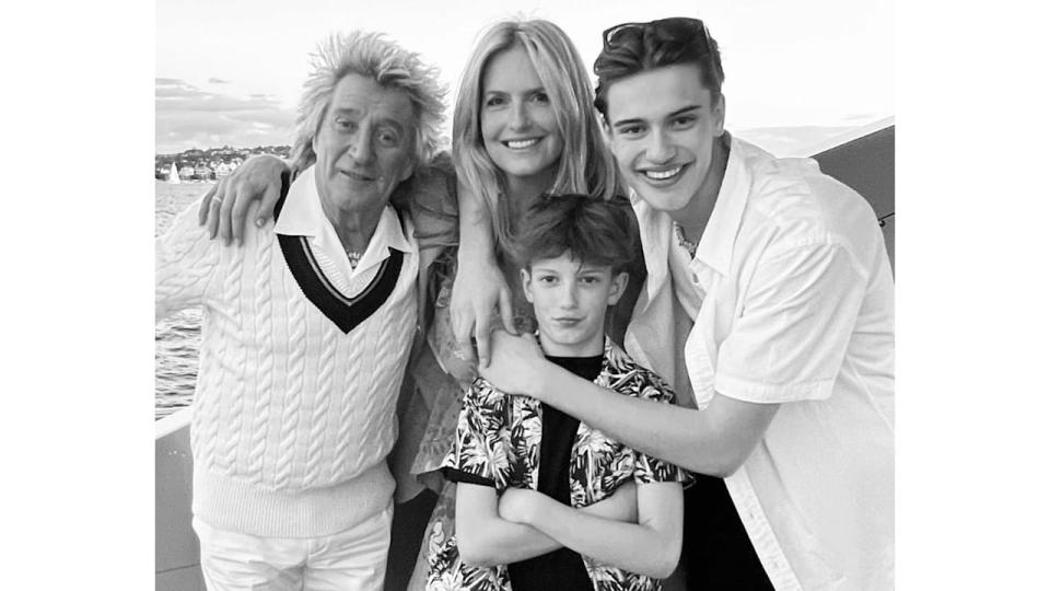 Rod Stewart, Penny Lancaster and their two sons pose by the ocean