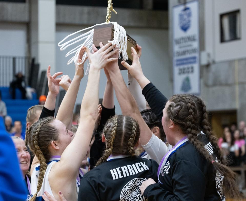 Dundee/Bradford players hold up the Class C2 championship block after defeating Keshequa.