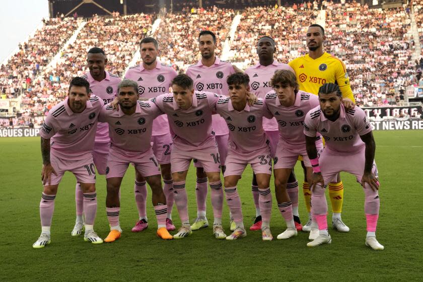 Inter Miami forward Lionel Messi, front, left, poses with his teammates before a Leagues Cup soccer match against Atlanta United, Tuesday, July 25, 2023, in Fort Lauderdale, Fla. (AP Photo/Lynne Sladky)