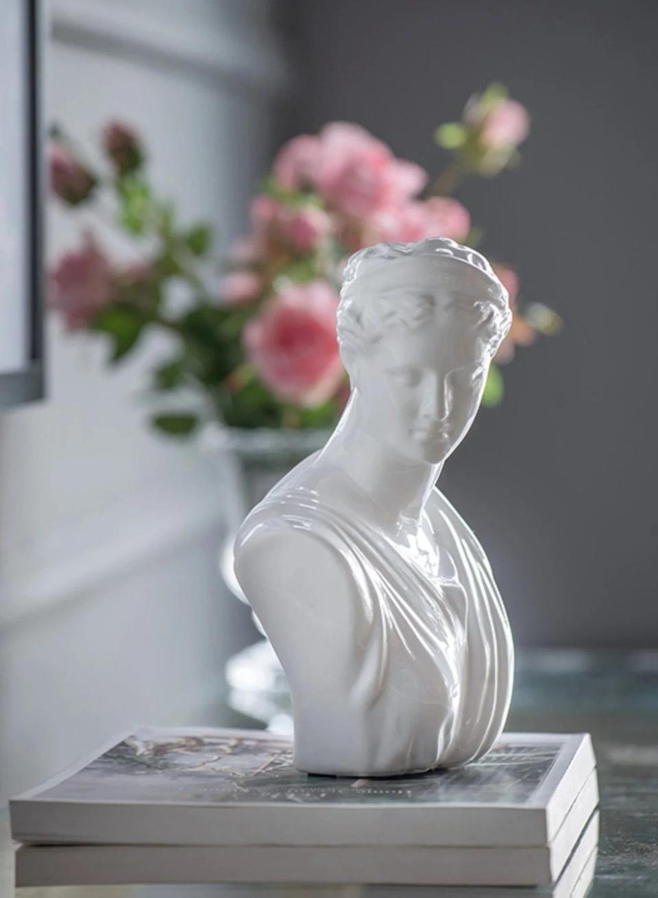 The bust of a woman in white