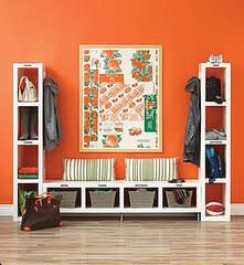 Practical Ikea shelving and a fun pop art print are a great complement to this beautiful orangeâ€¦