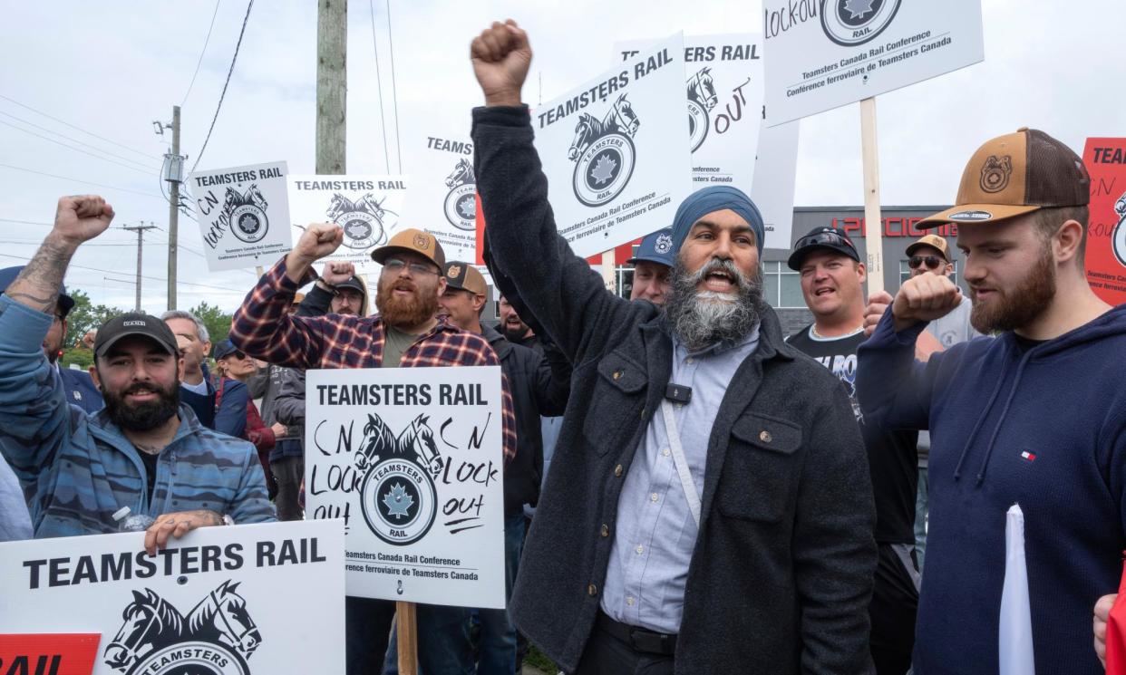 <span>NDP leader Jagmeet Singh with picketing rail workers in August 2024.</span><span>Photograph: Ryan Remiorz/AP</span>