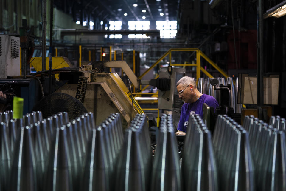 A steel worker manufactures 155 mm M795 artillery projectiles at the Scranton Army Ammunition Plant in Scranton, Pa., Thursday, April 13, 2023. One of the most important munitions of the Ukraine war comes from a historic factory in this city built by coal barons, where tons of steel rods are brought in by train to be forged into the artillery shells Kyiv can’t get enough of — and that the U.S. can’t produce fast enough. (AP Photo/Matt Rourke)
