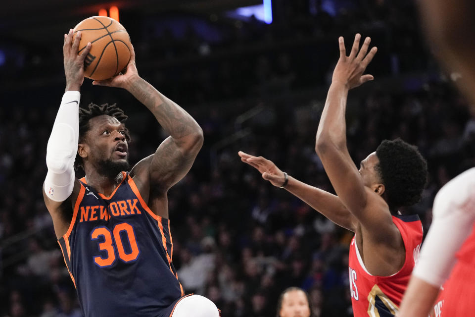 New York Knicks forward Julius Randle (30) shoots against New Orleans Pelicans forward Herbert Jones during the first half of an NBA basketball game Saturday, Feb. 25, 2023, at Madison Square Garden in New York. (AP Photo/Mary Altaffer)