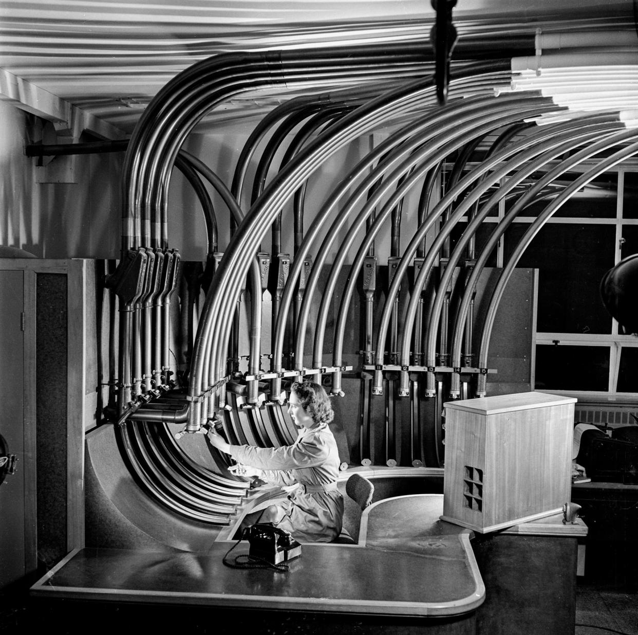 <span>A pneumatic tube operator, an obsolete occupation that the government argued people applying for benefits can do.</span><span>Photograph: Walter Nurnberg/SSPL/Getty Images</span>