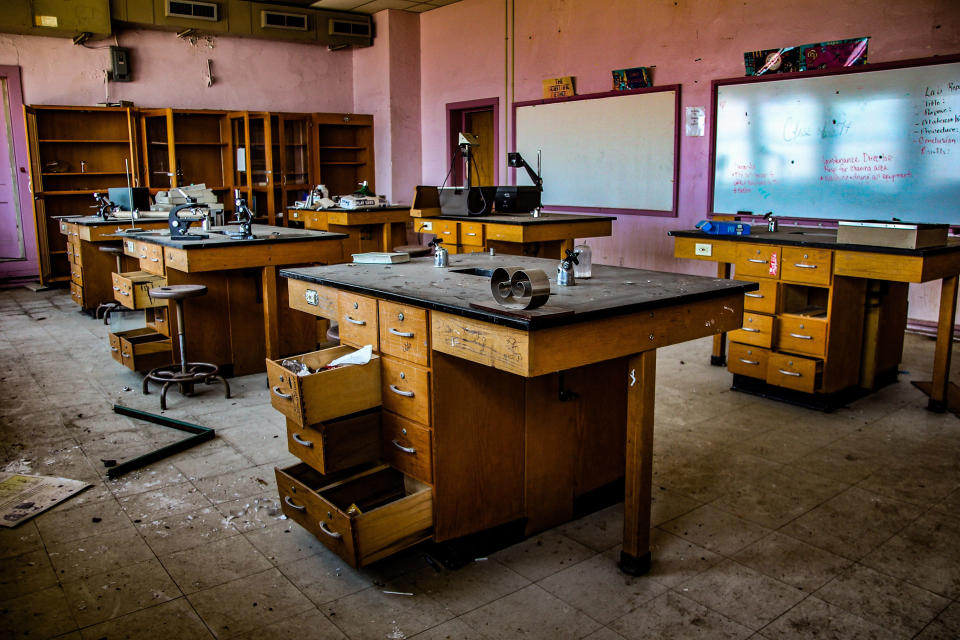 Eerie photographs capture abandoned school filled with dangerous chemicals