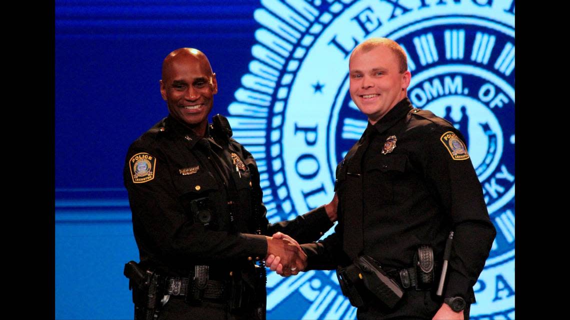 Lexington Police Chief Lawrence Weathers congratulates Samuel Hack, a Lexington native, on graduating from the Lexington police training academy on Jan. 6, 2023.