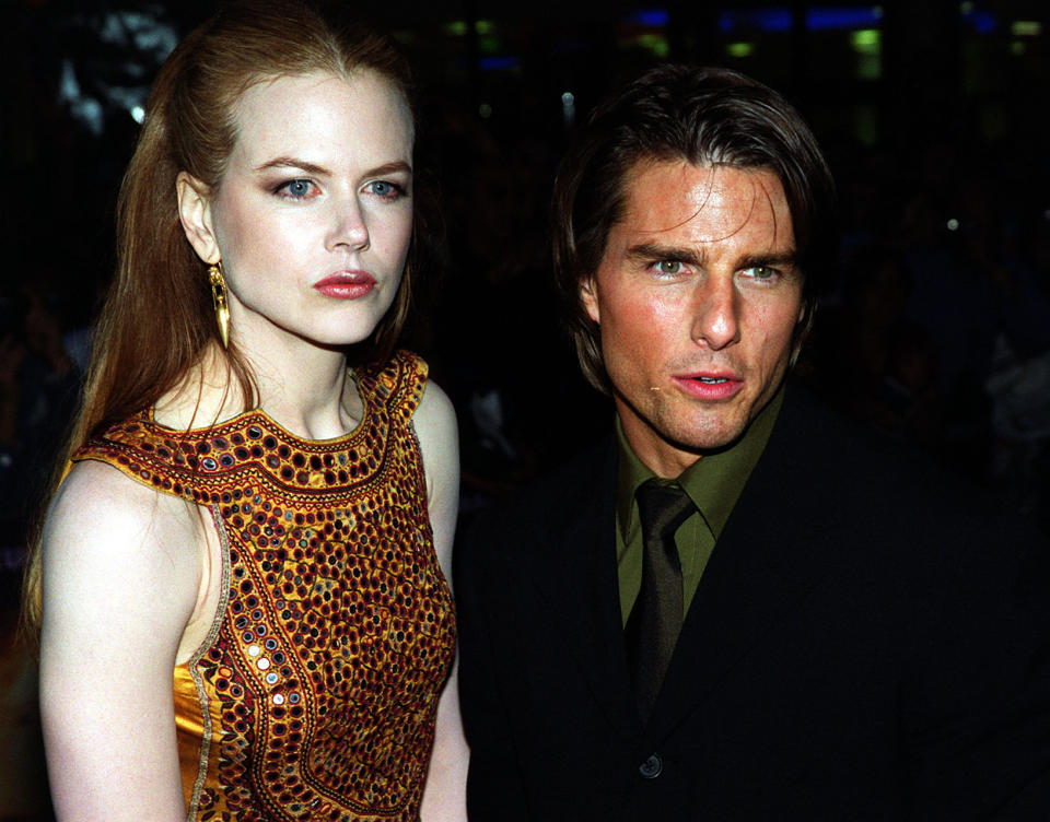 Husband and wife, American actor Tom Cruise and Austrailian actress Nicole Kidman, before the UK premiere of their new film "Eyes Wide Shut" directed by the Late Stanley Kubrick, at the Warner Village Cinema, Leicester Square in London.  * 05/02/01: The showbusiness couple announced they were separating, saying they were splitting because work was keeping them apart. 16/11/01: Tom Cruise and Nicole Kidman have agreed a private divorce settlement that will save them the embarrassment of a public court battle, it has emerged. Nine months after announcing their split, the Hollywood stars have "come to an amicable, full resolution of all issues", according to a statement from their lawyers.   (Photo by Michael Crabtree - PA Images/PA Images via Getty Images)