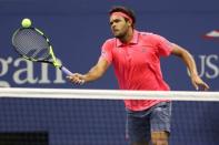 Sep 6, 2016; New York, NY, USA; Jo-Wilfried Tsonga of France hits a volley against Novak Djokovic of Serbia (not pictured) on day nine of the 2016 U.S. Open tennis tournament at USTA Billie Jean King National Tennis Center. Mandatory Credit: Geoff Burke-USA TODAY Sports