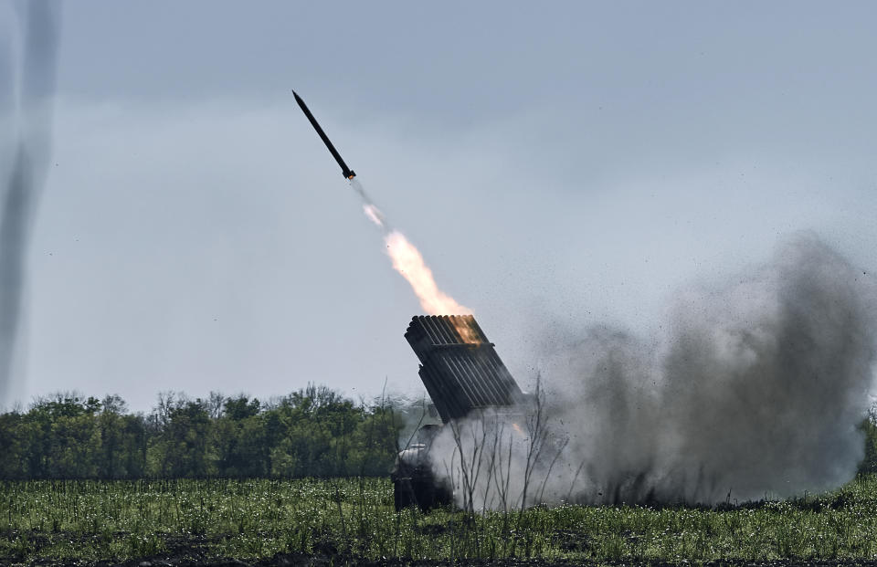 FILE - Ukrainian army Grad multiple rocket launcher fires rockets at Russian positions in the frontline near Bakhmut, Donetsk region, Ukraine, on May 3, 2023. When Russia invaded Ukraine in February 2022, Ukraine’s military was largely reliant on Soviet-era weaponry. While that arsenal helped Ukraine fend off an assault on the capital of Kyiv and prevent a total rout in the early weeks of the war, billions of dollars in military assistance has since poured into the country, including more modern Western-made weapons. (AP Photo/Libkos, File)