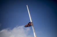 A half-mast Union flag marking the death of Prince Philip, in Gibraltar, Saturday April 10, 2021. Britain's Prince Philip, the irascible and tough-minded husband of Queen Elizabeth II who spent more than seven decades supporting his wife in a role that mostly defined his life, died on Friday. (AP Photo/Javier Fergo)