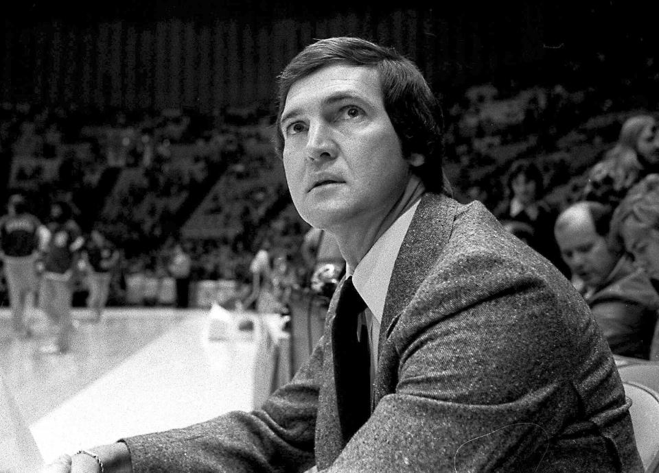 FILE - Los Angeles Lakers coach Jerry West sits on the Lakers' bench in Los Angeles, Jan. 28, 1977. Jerry West, who was selected to the Basketball Hall of Fame three times in a storied career as a player and executive and whose silhouette is considered to be the basis of the NBA logo, died Wednesday morning, June 12, 2024, the Los Angeles Clippers announced. He was 86. (AP Photo/File)
