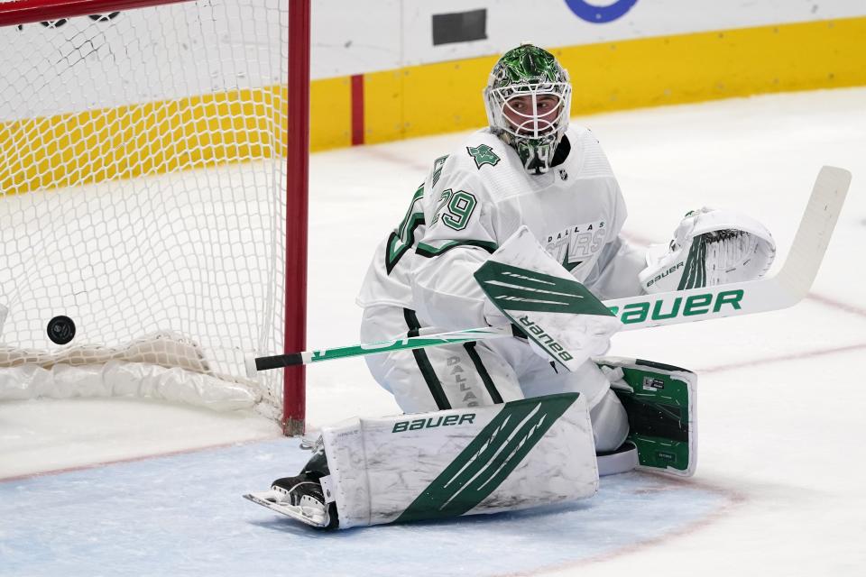 Dallas Stars goaltender Jake Oettinger looks back at the net after a score by Detroit Red Wings center Valtteri Filppula (51) in the second period of an NHL hockey game in Dallas, Tuesday, April 20, 2021. (AP Photo/Tony Gutierrez)