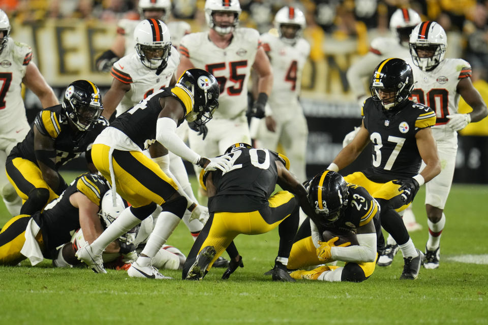 Pittsburgh Steelers safety Damontae Kazee (23) recovers a fumble by Cleveland Browns tight end David Njoku during the second half of an NFL football game Monday, Sept. 18, 2023, in Pittsburgh. (AP Photo/Gene J. Puskar)