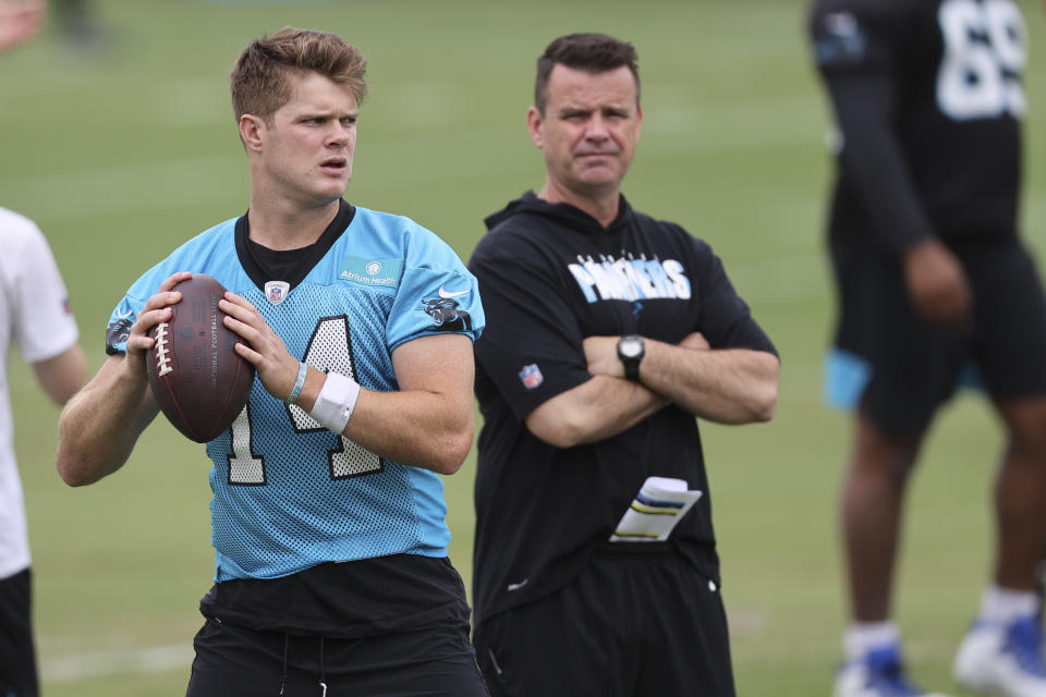 Carolina Panthers quarterback Sam Darnold looks to pass during NFL football practice in Charlotte, N.C., Wednesday, June 2, 2021. (AP Photo/Nell Redmond)
