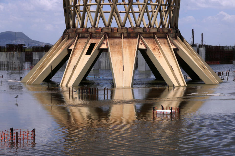 A general view shows parts of the structure of flight terminal at an abandoned construction site of a Mexico City airport that was scrapped two years ago, now flooded by summer rains, in Texcoco on the outskirts of Mexico City, Mexico September 3, 2020. Picture taken September 3, 2020.REUTERS/Henry Romero