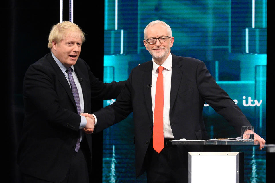 SALFORD, ENGLAND - NOVEMBER 19: (AVAILABLE FOR EDITORIAL USE UNTIL DECEMBER 19, 2019) In this handout image supplied by ITV, Prime Minister Boris Johnson and Leader of the Labour Party Jeremy Corbyn shake hands during the ITV Leaders Debate at Media Centre on November 19, 2019 in Salford, England. This evening ITV hosted the first televised head-to-head Leader’s debate of this election campaign. Leader of the Labour party, Jeremy Corbyn faced Conservative party leader, Boris Johnson after the SNP and Liberal Democrats lost a court battle to be included. (Photo by Jonathan Hordle//ITV via Getty Images)