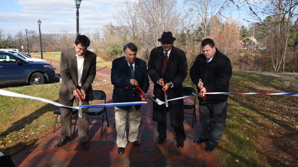 Officials celebrate the completion of the Capital City Trail in Dover in 2014.