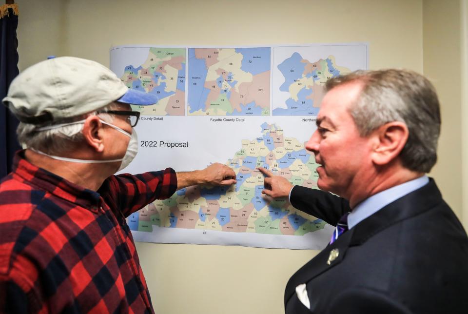Speaker of the House David Osborne-R, right, talks with Franklin County resident Bill Klier, who had questions about the changes after a press conference Thursday morning. "The variation of one single percent has ripple effects across the state," Osborne said. Dec.30, 2021 