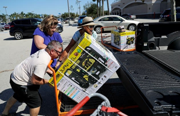 Man plugging in generator