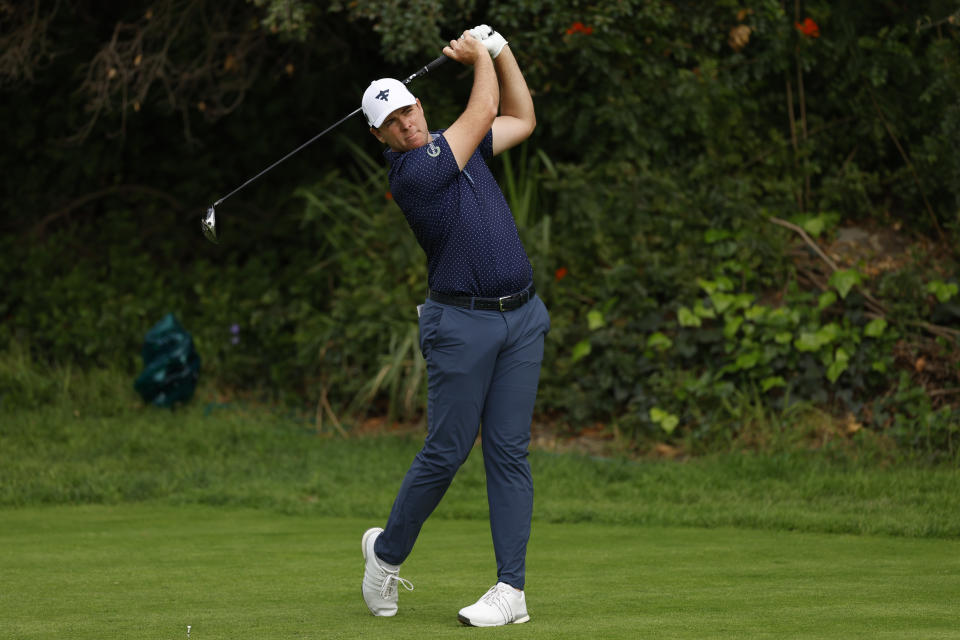 Luke List hits from the 13th tee during the final round of the Genesis Invitational golf tournament at Riviera Country Club, Sunday, Feb. 18, 2024, in the Pacific Palisades area of, Los Angeles. (AP Photo/Ryan Kang)