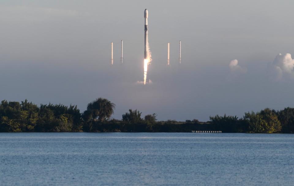 A SpaceX Falcon 9 rocket clears low-lying fog and the lightning protection system at Cape Canaveral Space Force Station's Launch Complex 40 on Saturday, Nov. 13, 2021. The mission marked the 31st for SpaceX's Starlink internet constellation.