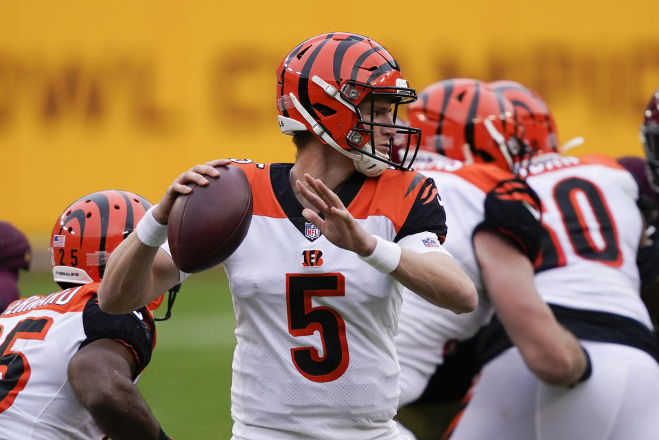 Cincinnati Bengals quarterback Ryan Finley (5) pass the ball during the second half of an NFL football game against the Washington Football Team, Sunday, Nov. 22, 2020, in Landover. (AP Photo/Susan Walsh)