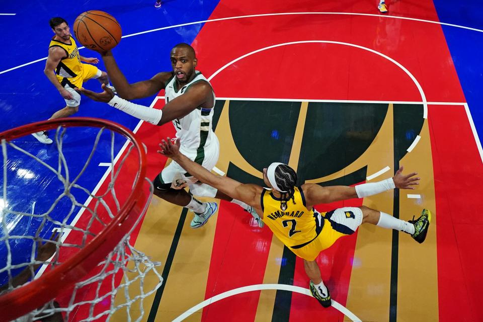 Bucks forward Khris Middleton goes up for a shot in the lane against Pacers guard Andrew Nembhard in the team's In-Season Tournament semifinal game Thursday in Las Vegas.