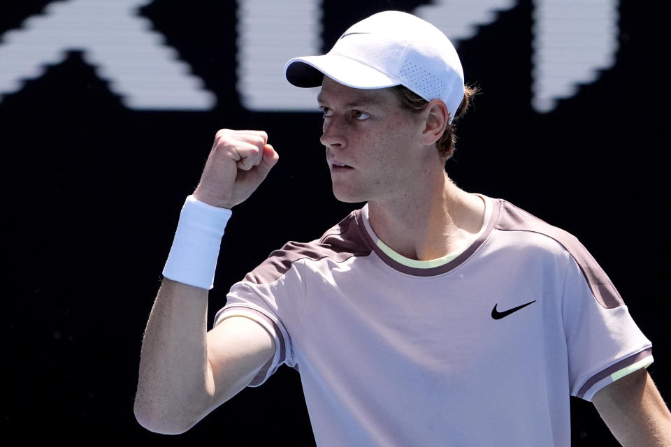 Jannik Sinner of Italy reacts during his semifinal against Novak Djokovic of Serbia at the Australian Open tennis championships at Melbourne Park, Melbourne, Australia, Friday, Jan. 26, 2024. (AP Photo/Andy Wong)