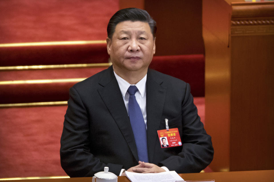 FILE - In this March 12, 2019, file photo, Chinese President Xi Jinping attends a plenary session of China's National People's Congress (NPC) at the Great Hall of the People in Beijing. The country's foreign ministry announced on Monday, March 18, 2019 that Xi will visit Italy, France and Monaco from Thursday to March 26. (AP Photo/Mark Schiefelbein, File)