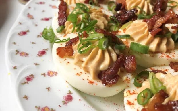 <p><a href="https://parade.com/871591/solanahawkenson/alex-guarnaschellis-fiery-bacon-deviled-eggs/" rel="nofollow noopener" target="_blank" data-ylk="slk:Alex Guarnaschelli;elm:context_link;itc:0;sec:content-canvas" class="link ">Alex Guarnaschelli</a></p>