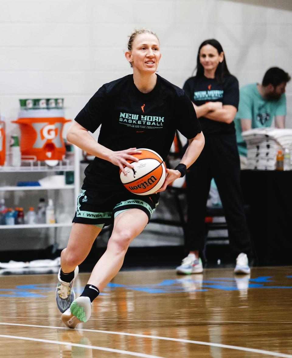 New York Liberty basketball player Courtney Vandersloot takes part in WNBA training camp in Brooklyn, N.Y., April 30, 2023. Vandersloot wasn't sure whether she wanted to come to New York this season to play and solidify the incredible team that the Liberty were building. Coming to New York though would mean she'd be far away from her mom, Jan, who was diagnosed with advanced multiple myeloma cancer last July. (New York Liberty/Brandon Todd via AP)