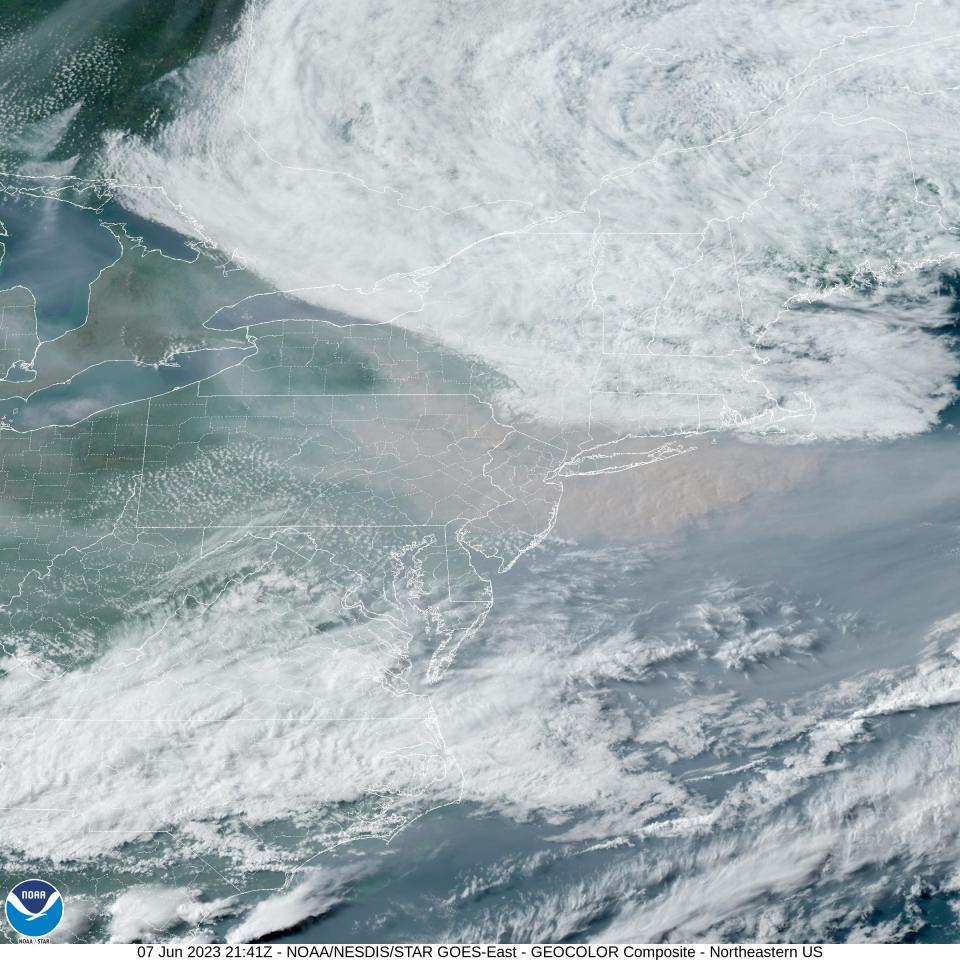 Satellite image shows the smoke blanketing New Jersey.