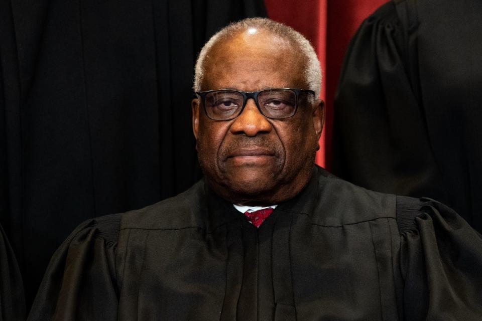 Associate Justice Clarence Thomas sits during a group photo of the Justices at the Supreme Court in Washington, DC on April 23, 2021 (Getty Images)