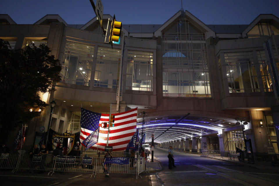 A handful of supporters of President Donald Trump protest outside the Pennsylvania Convention Center, where vote counting continues, in Philadelphia, Monday, Nov. 9, 2020, two days after the 2020 election was called for Democrat Joe Biden. (AP Photo/Rebecca Blackwell)