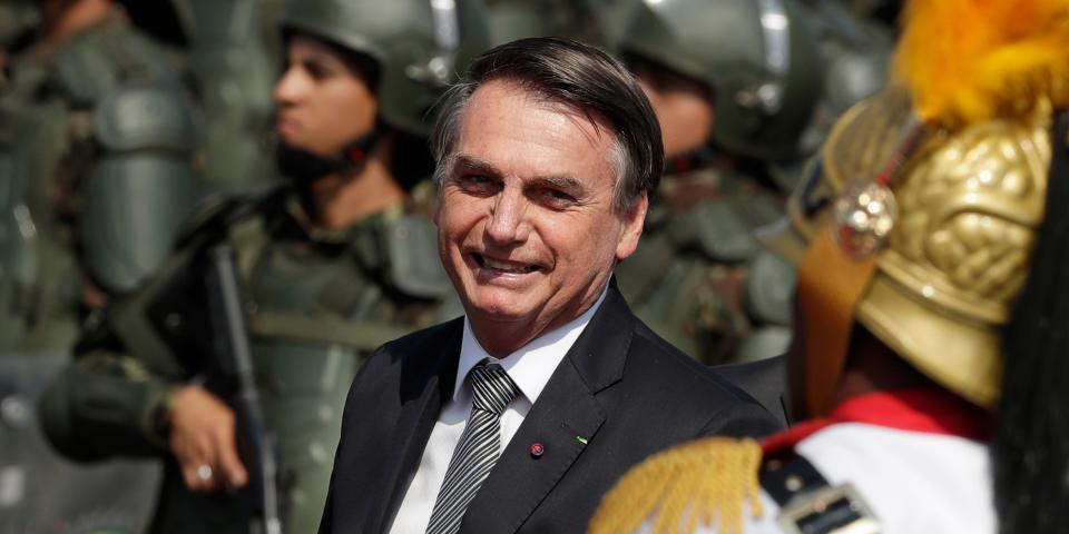 Brazils President Jair Bolsonaro arrives to attend a military ceremony for the Day of the Soldier, at Army Headquarters in Brasilia, Brazil, Friday, Aug. 23, 2019. Bolsonaro says he's leaning toward sending the army to help fight Amazon fires that have alarmed people across the globe