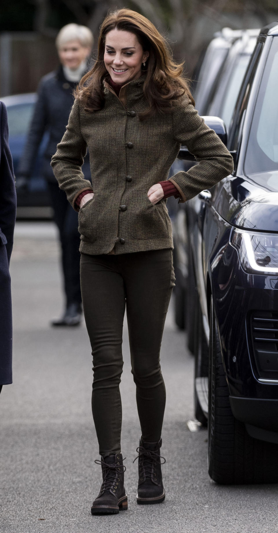 The duchess paired her outfit with See by Chloé boots. (Photo: Mark Cuthbert/UK Press via Getty Images)