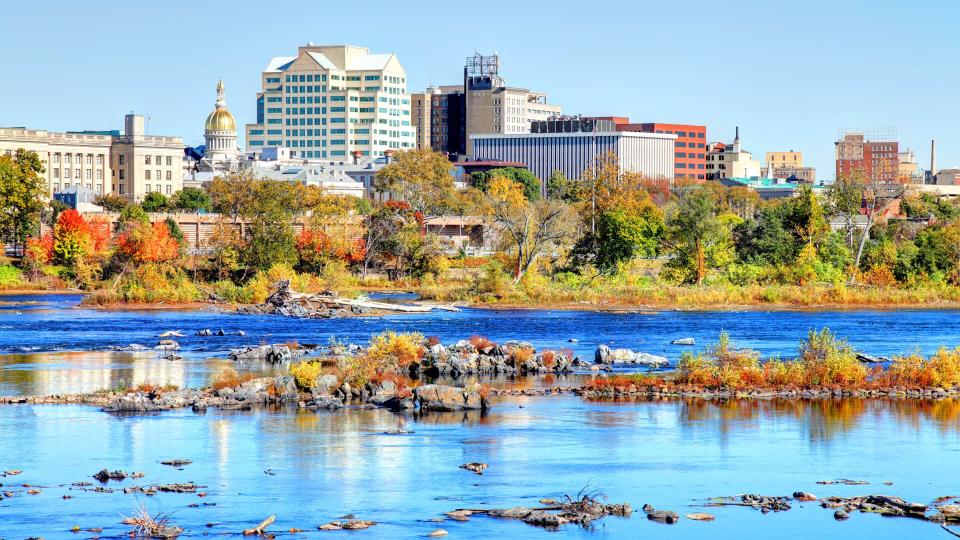 The New Jersey State House and Trenton skyline  along the Delaware River is located in Trenton and is the house of government for the U.