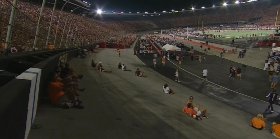 Fans sitting on the track watching the Battle at Bristol (ESPN)