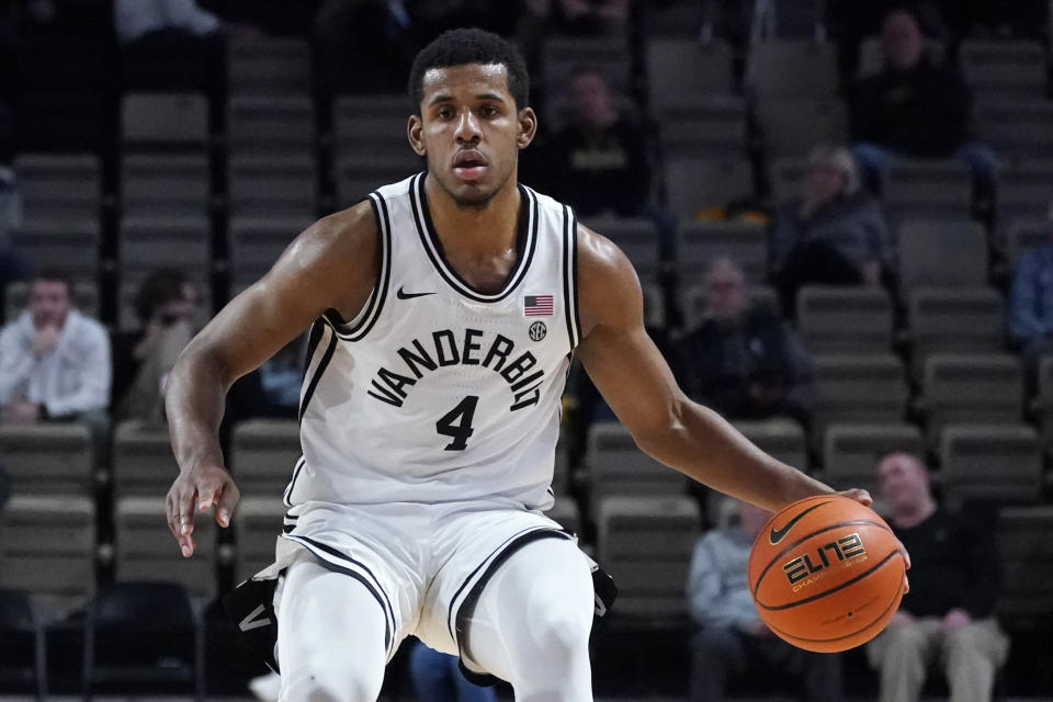 FILE — Vanderbilt's Jordan Wright plays against Temple in an NCAA college basketball game Dec. 7, 2021, in Nashville, Tenn. Wright, who was Vanderbilt's second-leading scorer averaging 12.3 points a game, ranked 11th in the SEC with 6.4 rebounds a game. (AP Photo/Mark Humphrey, File)