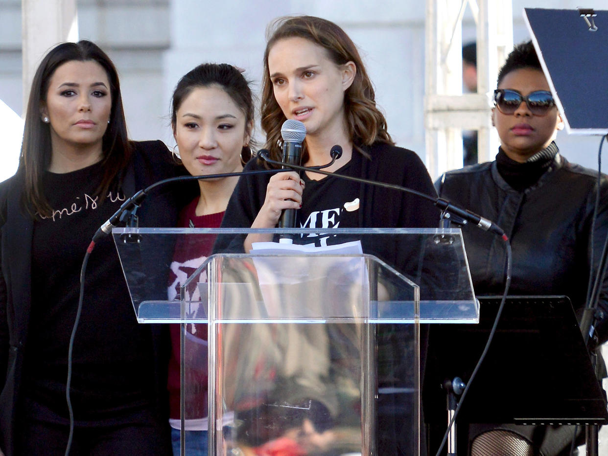 Actors Eva Longoria, Constance Wu and Natalie Portman speak during the Women's March on 20 January 2018 in Los Angeles, California: Getty