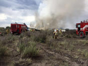 <p>Firefigters and rescue personnel work at the site where an Aeromexico-operated Embraer passenger jet crashed in Mexico’s northern state of Durango, July 31, 2018, in this picture obtained from social media. (Photo: Proteccion Civil Durango via Reuters) </p>