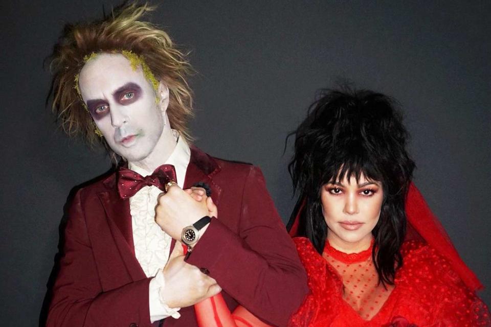 <p>Kourtney Kardashian/Instagram</p> Kourtney Kardashian and Travis Barker dress up in 