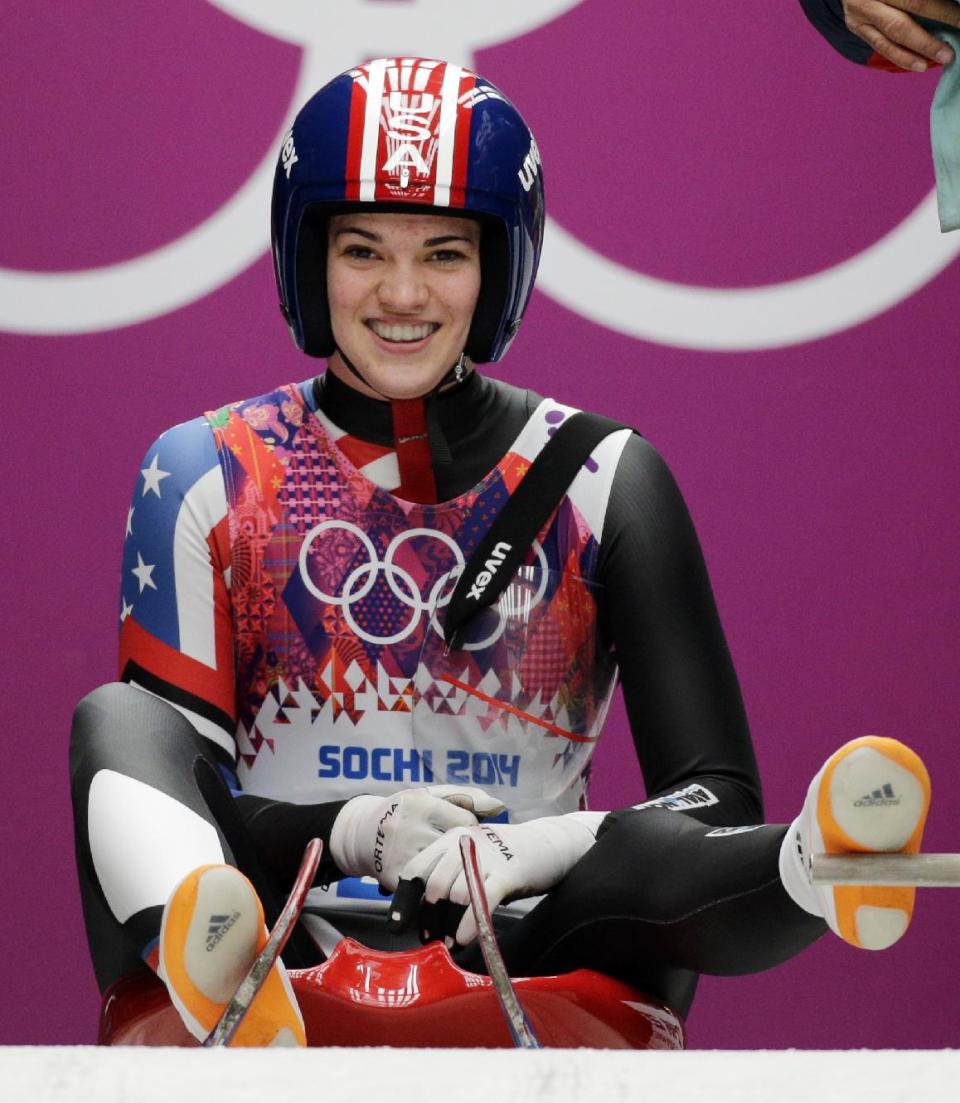 Summer Britcher of the United States prepares to start her first run during the women's singles luge competition at the 2014 Winter Olympics, Monday, Feb. 10, 2014, in Krasnaya Polyana, Russia. (AP Photo/Jae C. Hong)