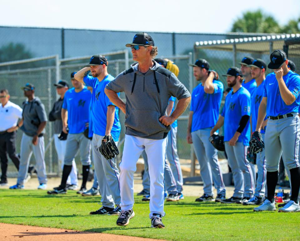 Miami Marlins manager Don Mattingly looks on during the team's spring training baseball workout at Roger Dean Stadium on Thursday, March 17, 2022, in Jupiter, Fla. (David Santiago/Miami Herald via AP)
