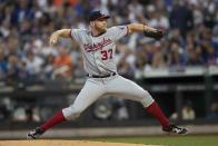 Washington Nationals starting pitcher Stephen Strasburg delivers during the first inning of a baseball game against New York Mets, Friday, Aug. 9, 2019, in New York. (AP Photo/Mary Altaffer)